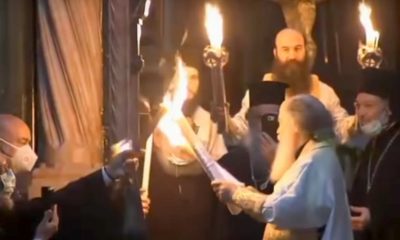 Mai mulţi credincioşi din Ierusalim au ignorat restricţiile anti COVID-19 pentru a primi Lumina Sfântă
