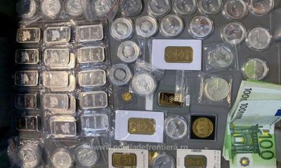 Pasager prins pe Aeroportul Cluj cu monede și lingouri ascunse în bagaj