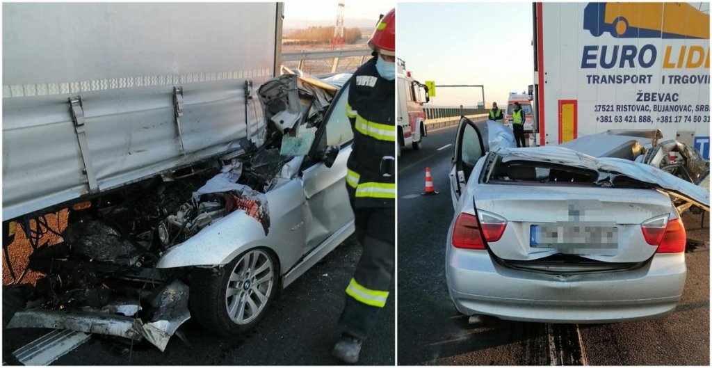 Șofer mort după un impact devastator. A intrat cu BMW-ul sub TIR